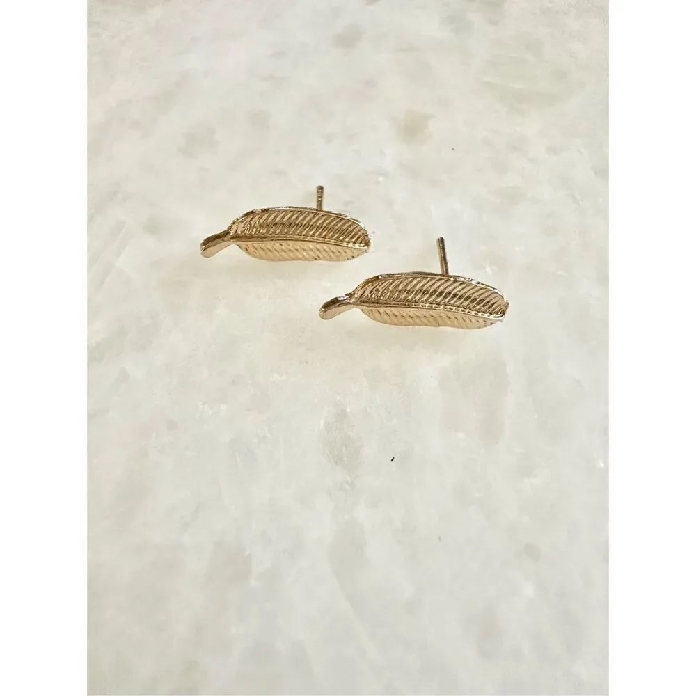 Gold color leaf minimalistic stud earrings